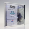Acrylic financial tombstones announcing sibanye stillwater's acquisition of a 19.99% stake in new century resources, with financial details included, displayed on a reflective surface.