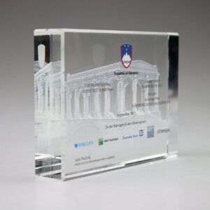 crystal tombstones commemorating eurobond funding for the republic of slovakia, featuring etched text and logos of banks like barclays and deutsche bank.