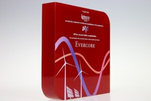 Red financial tombstones featuring the "igneo" and "evercore" logos, with graphic designs of white and purple curves and text about project completion and capacity.